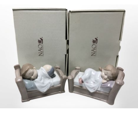 Two Nao figures of sleeping children, No. 1503 and 1504, both with original boxes. 