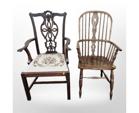 A 19th century elm Windsor chair and a carved mahogany Chippendale style armchair 