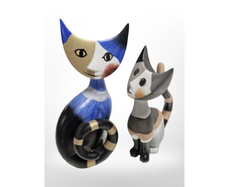 Two Goebel figures of seated cats, tallest 17 cm. 