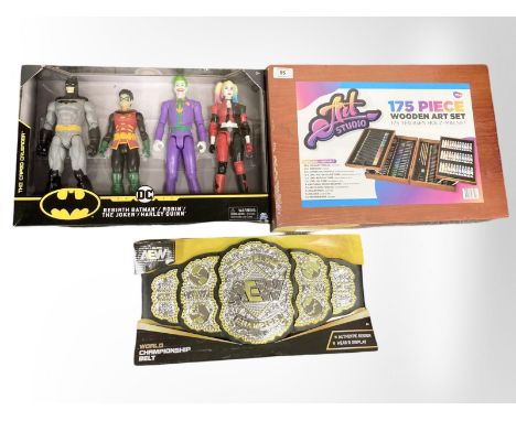 An Art Studio 175 piece wooden art set, together with DC Batman figure set and a World Champion wrestling belt. 