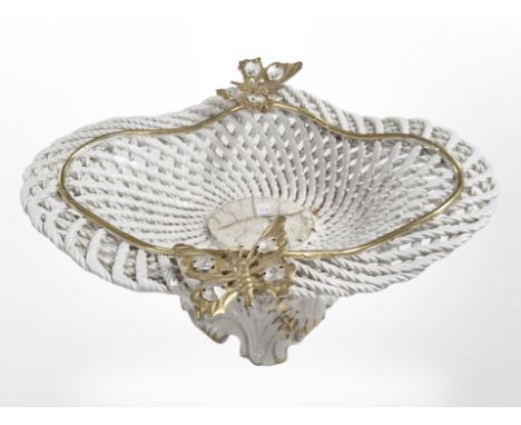 A reproduction Italian ceramic table centrepiece, height 19cm. 
