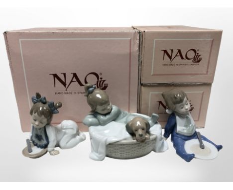 Three Nao figures of children, No. 1416, 1074 and 1076, all with original boxes. 