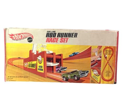 HOT WHEELS ROD RUNNER RACE SET, AND LAP COUNTER, along with a Corgi Grand Canyon speed circuitlargests box 65cm longQty: 3The