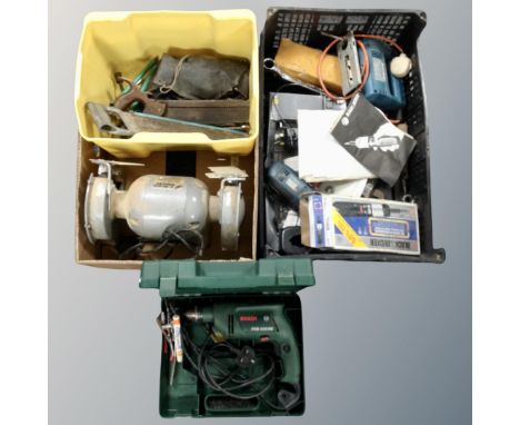 Two crates of power tools, Bosch electric hammer drill, 6'' bench grinder, hand tools, Black and Decker power tools etc 