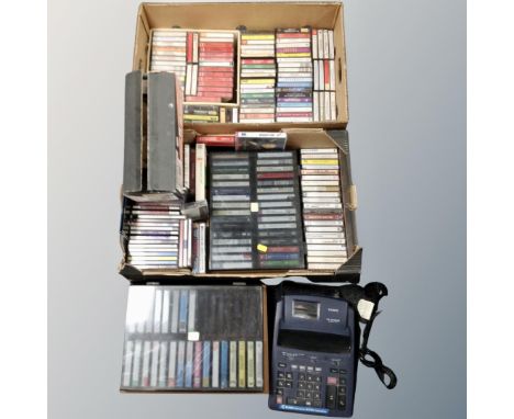 Two crates of CD's and audio cassettes together with a Casio FR-620 TER electric calculator with rolls 