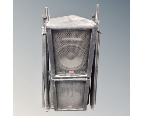 A pair of Stagg professional mixer amplifier speakers on tripod stands 