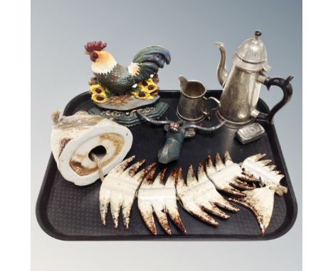 A tray of plated wares, cast iron Stags head wall rack, cockerel door stop and a hanging ceramic fish ornament 