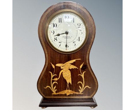 An Art Nouveau satinwood-inlaid mantel clock retailed by Goldsmiths Co, Newcastle, with key, height 26cm