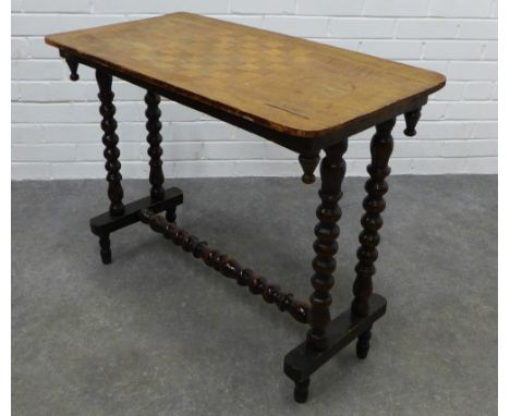 Victorian table with double bobbin legs and stretcher, possibly with a replacement Games table top. 67 x 82 x 42cm. (a/f) 