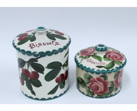 Wemyss Ware cabbage rose pattern biscuit jar and over and a restored  Wemyss plum pattern biscuit jar and cover (2) 17 x 13cm