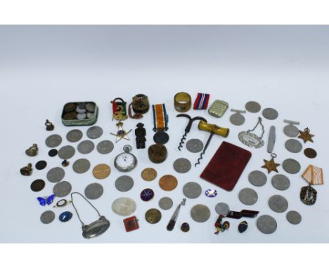 A quantity of miscellaneous WWII medals, coins, commemorative coins, vesta case, corkscrews and enamel badges and pins, etc (