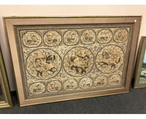 An embroidered Indian tapestry, framed. 