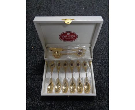 A boxed set of Royal Albert Old Country Roses gold plated tea spoons 