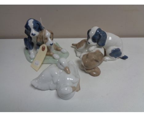 Three Nao figure groups - Puppies and ducks.