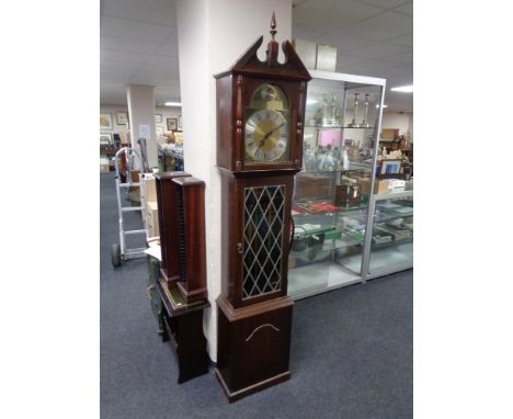 A Tempus Fugit longcase clock with pendulum and weights 