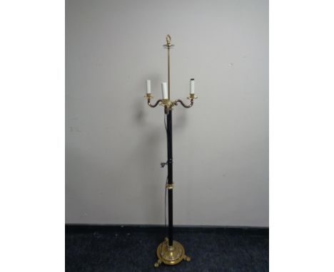 A 20th century decorative metal and gilt standard lamp (continental wiring) 