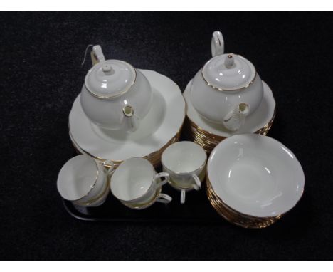An extensive Duchess White and Gilt tea and dinner service 