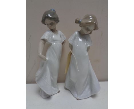 Two Nao figures  - Girl in night dress no. 1109 1110. (2)