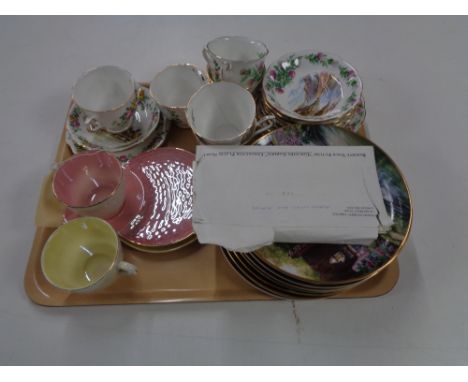 A tray of six Royal Albert china trios, Franklin mint collectors plates, two Maling lustre cups with saucers 