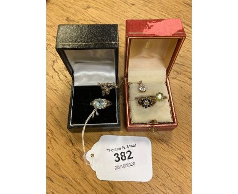 A 9ct white gold dress ring together with two further 9ct gold rings and a 14ct gold pendant on 9ct gold chain.