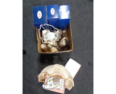 A box of figurines, Italian figural lamp with shade, boxed Regal collection figures etc 