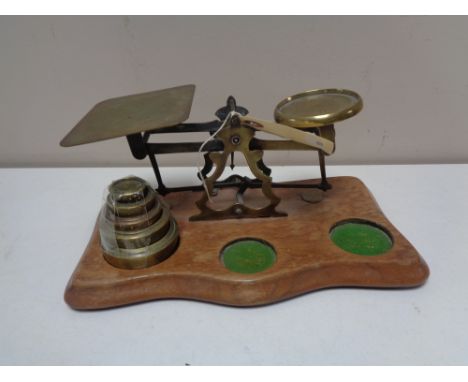 A set of twentieth century brass postal scales and weights 