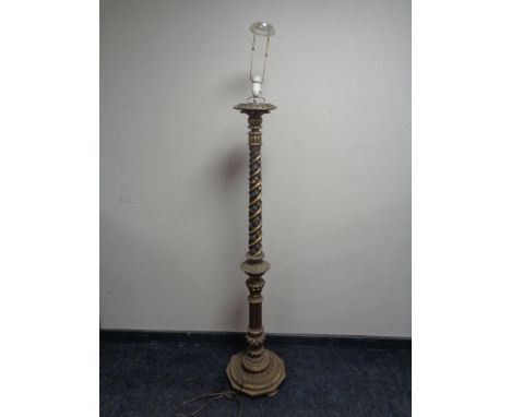 An antique gilt and gesso standard lamp (continental wiring) 