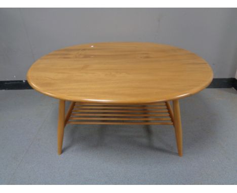 An Ercol elm coffee table with under shelf 