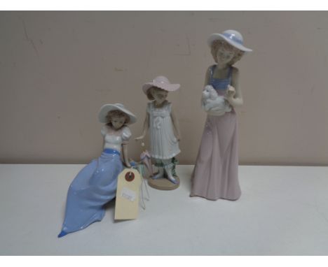 Nao figure - Lady Seated no. 1042 together with a further Nao figure - lady with puppy no. 1157 and Girl with parasol