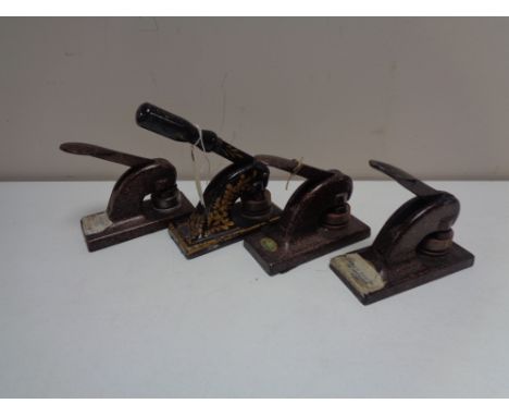 Four vintage desk punches 