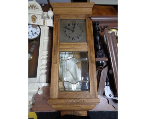 An early 20th century eight day wall clock signed Lund, Odense 