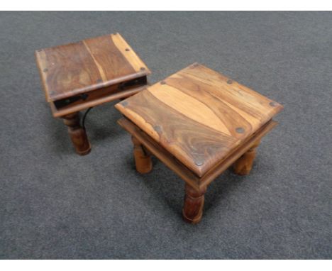 A pair of sheesham wood lamp tables 
