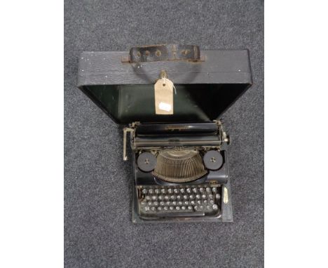 A cased vintage Simplex Olympia typewriter 