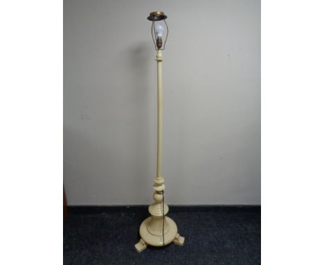 An antique painted standard lamp (continental wiring) 