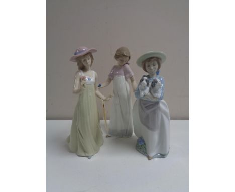 Three Nao figures - Girl with candle, flower and puppies (3)