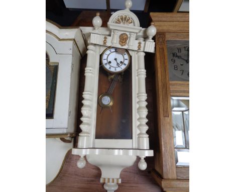 An early 20th century eight day wall clock in painted case (a/f) 