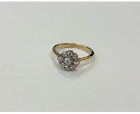 An antique 18ct gold diamond floral cluster ring 