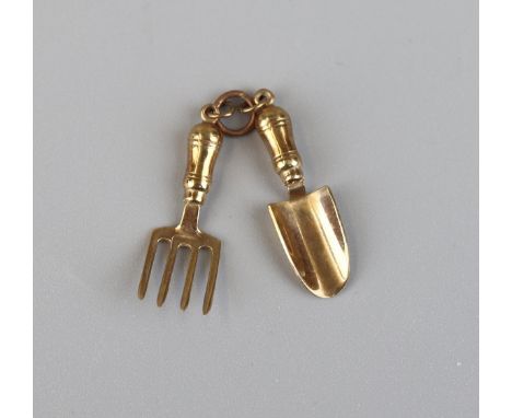 Gold gardeners trowel and fork pendant