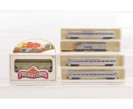 Model Power N Gauge Amtrak Diesel Locomotive and Coaches, cased Model Power 7649 Amtrak diesel locomotive #113 and three coac