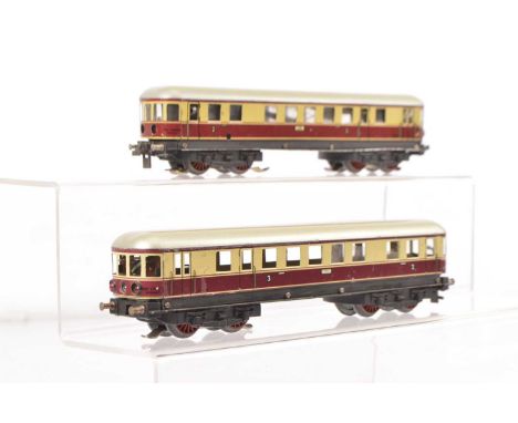 A Trix 00 Gauge 14v AC 'Continental-style' 2-car Diesel Train, a post-war version (without the Eagle), in crimson and cream w