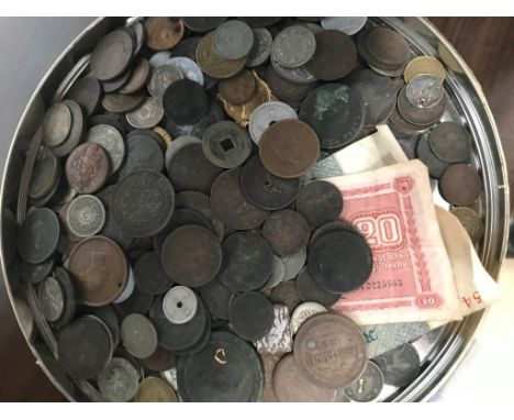 A quantity of vintage coins and tokens