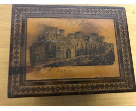 A 19th century Tunbridgeware tea caddy with castle atop