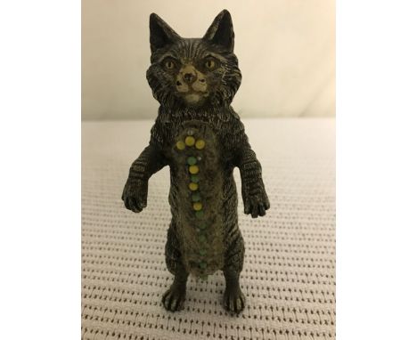 A cold-painted bronze pin cushion in the form of a cat, marked 'Geschutz'