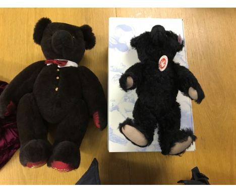 A boxed Steiff classic black mohair bear; together with 'Imperial Bear' by Sarah Faberge - in red drawstring bag