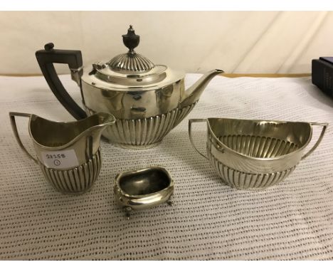 A HM silver tea service; together with a HM silver salt