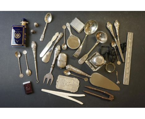 A collection of hallmarked silver and silver plated items to include Thimbles, button hooks, vesta case, Mirror and cutlery. 