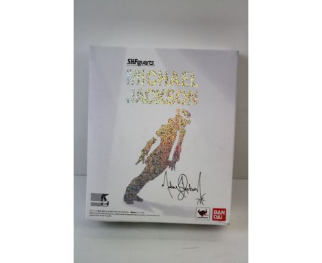 A boxed Michael Jackson action figure. 