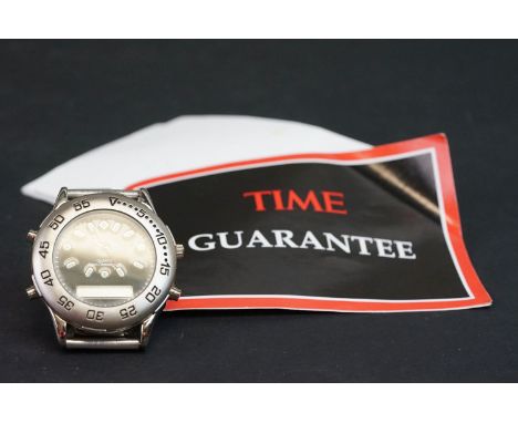 A gents Time quartz alarm chronograph wristwatch with papers. 