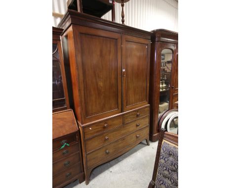 George III Mahogany Linen Press, the upper section with two panel doors opening to five slides, above two short and two long 