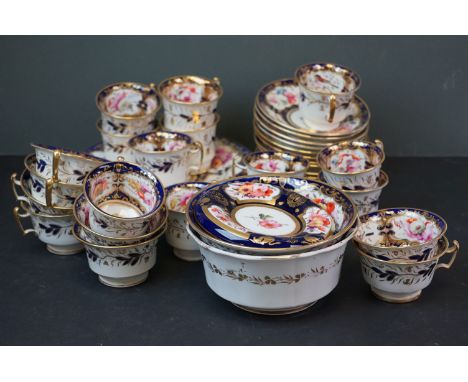 19th century Part Tea Service decorated with birds and flowers on a part cobalt blue and gilt ground, approximately 37 pieces